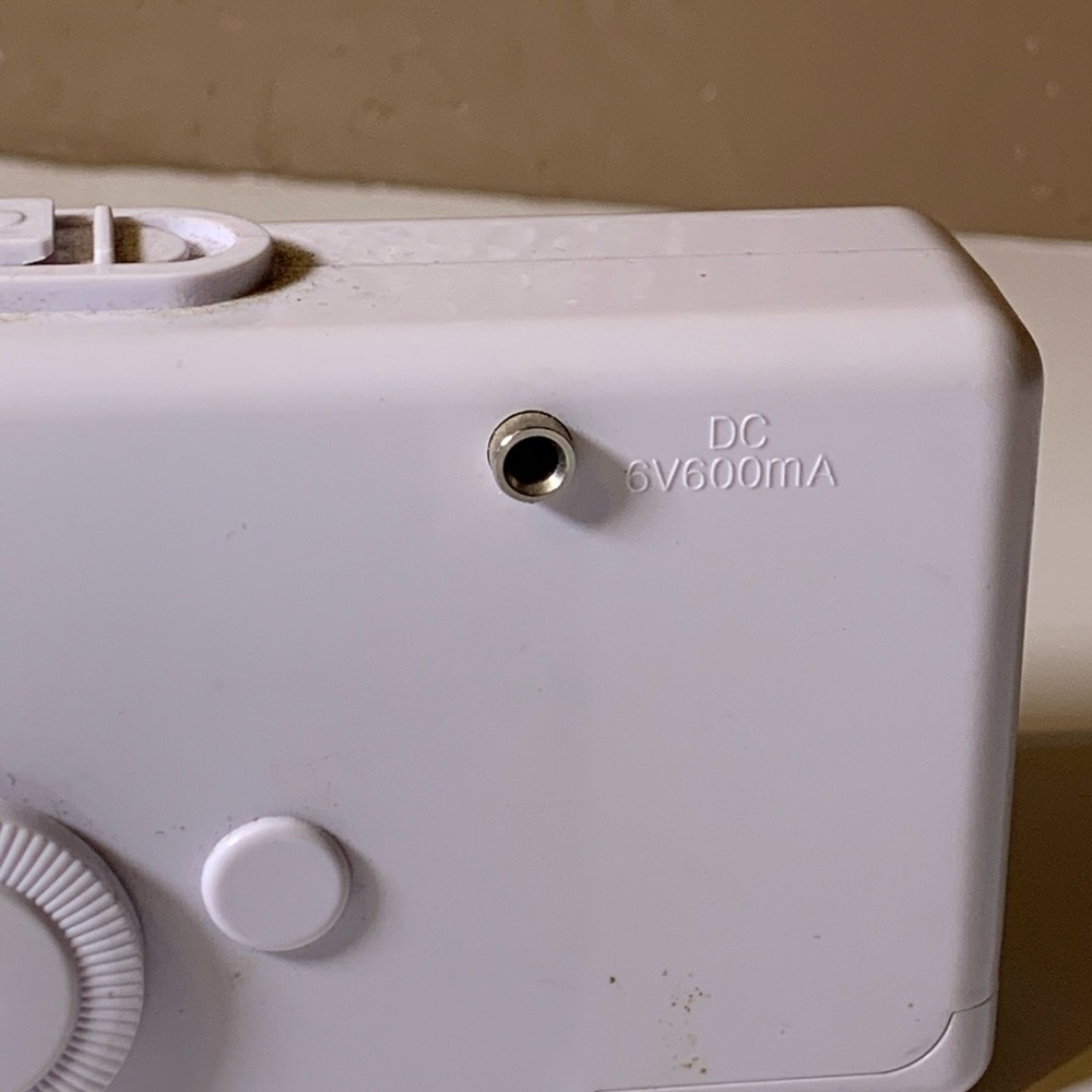 Compact White Handheld Sewing Machine - Picture 4 of 6